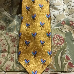 Elegant Gold Tie with Blue Floral Pattern